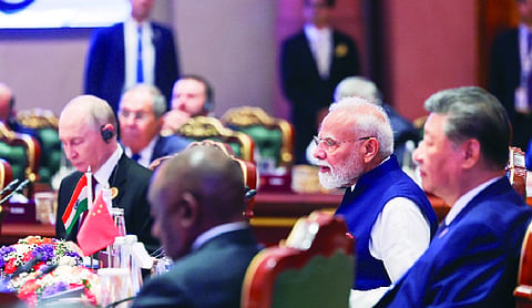 PM Modi’s warm gesture to Xi steals the show at BRICS summit