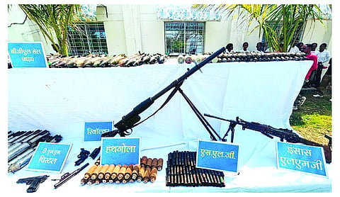 Police seize `1 crore cash, arms from Maoist dumps
