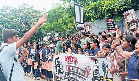 Polytechnic students and staff stage a protest against the proposed merger of government polytechnic colleges with Young India Skills University in Telangana. Photo: X