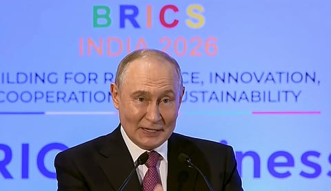 Russian President Vladimir Putin addresses the BRICS Business Forum in New Delhi. PTI photo