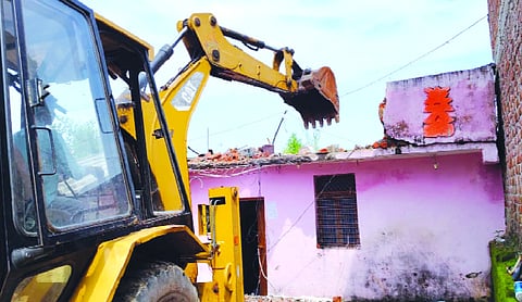 Sagar spurious liquor deaths: Administration demolishes 5 illegal structures linked to accused