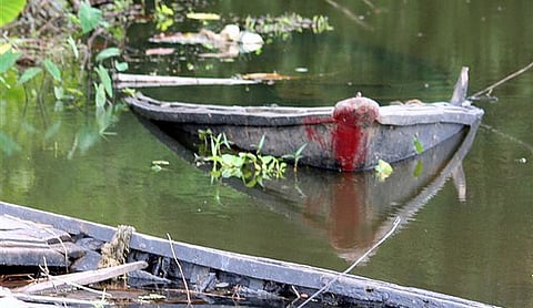 Representational image: a boat on a pond.