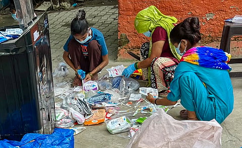 An upcycling centre where discarded plastics are cleaned and turned into commercial goods, in New Delhi. PTI photo
