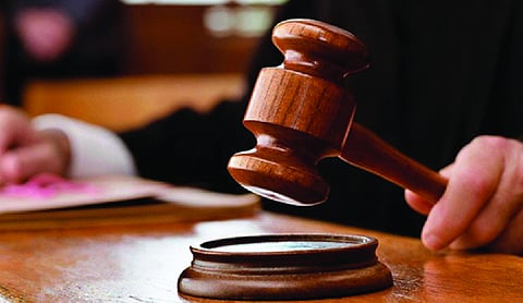 Woman gets life term for throwing acid on husband