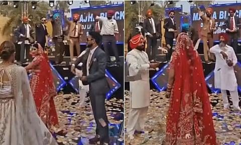 திருமண வரவேற்பில் மணமகளை ரூபாய் நோட்டுகளை தூவி வரவேற்ற மணமகன் குடும்பத்தினர்