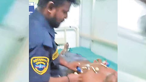 நோயாளிக்கு காவலாளி இ.சி.ஜி. எடுத்ததால் பரபரப்பு