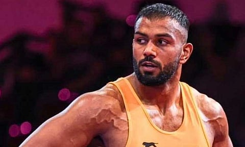 ஆசிய விளையாட்டு: இந்திய மல்யுத்த வீரர் நிதேஷ் வெள்ளி வென்றார்