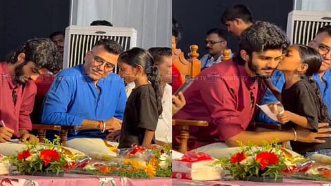 இசை நிகழ்ச்சியில் இசையமைப்பாளருக்கு முத்தப் பரிசைக் கொடுத்த சிறுமி.