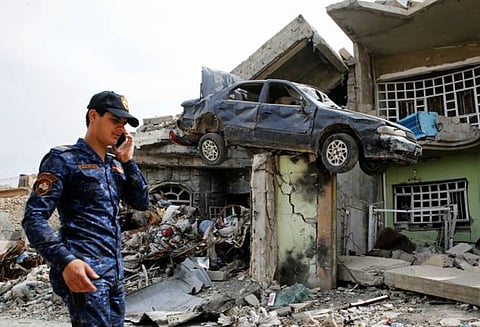 ஈராக்கில் நடந்த கார் வெடிகுண்டு தாக்குதல்: 5 பாதுகாப்பு வீரர்கள் உள்பட 11 பேர் பலி