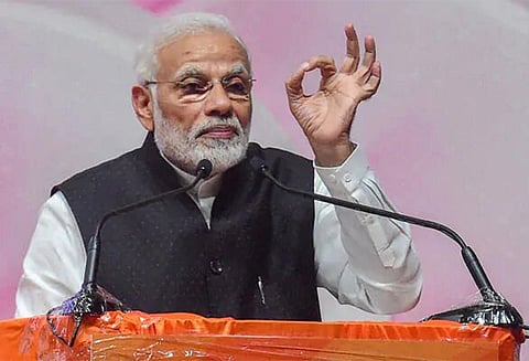 விவசாயக் கடன் தள்ளுபடி விவகாரத்தில் காங்கிரஸ் விவசாயிகளை தவறாக வழிநடத்துகிறது - பிரதமர் மோடி