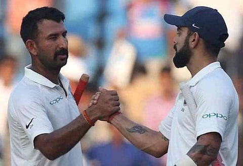 ஐ.சி.சி. தரவரிசையில் விராட் கோலி, புஜாரா நீடிப்பு; அஸ்வின் சரிவு