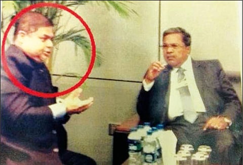 மோசடி செய்த தொழில் அதிபரை சித்தராமையா பாதுகாக்க முயற்சி