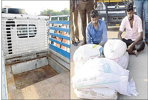 சரக்கு வாகனத்தில் ரகசிய அறை அமைத்து 300 லிட்டர் சாராயம் கடத்தல் 2 வாலிபர்கள் கைது