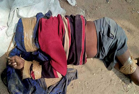 மதுரை அருகே மூச்சை திணறடித்து காவலாளி கொலை