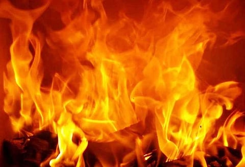 பண மோசடி செய்த மகன் தலைமறைவு: பெற்றோர் தீக்குளித்து தற்கொலை