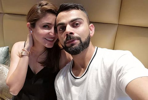 வெளிநாட்டு தொடர்களுக்கான பயணம்: இந்திய வீரர்கள் மனைவியுடன் தங்குவதற்கு அனுமதிக்க வேண்டும் - கேப்டன் கோலி கோரிக்கை