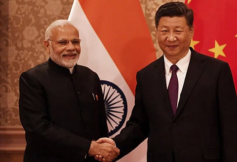 வர்த்தக போரை எதிர்கொள்ள ஒருங்கிணைந்து செயல்படுவோம்: இந்தியாவுக்கு சீனா அழைப்பு