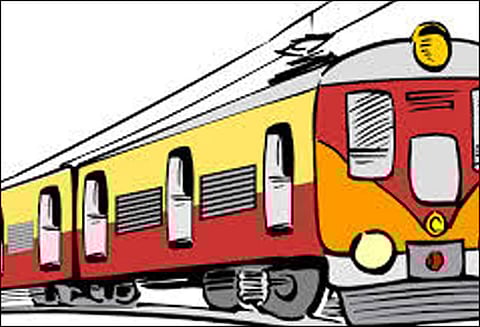 ரெயில் மேற்கூரையில் ஏறிய வாலிபர் உடல் கருகினார் மின்சாரம் தாக்கியது