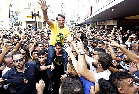 பிரேசிலில் கத்தி குத்துக்கு ஆளான அதிபர் வேட்பாளருக்கு வெற்றி வாய்ப்பு அதிகம்; கருத்து கணிப்பில் தகவல்