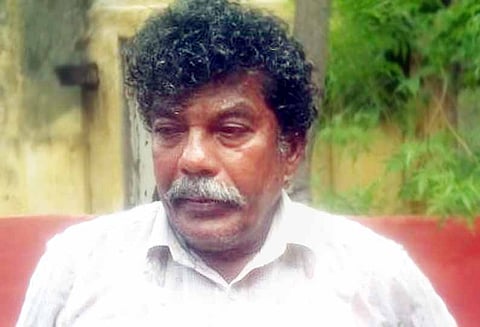 உடலில் மண்எண்ணெய் ஊற்றி கோர்ட்டு வளாகத்தில் தற்கொலைக்கு முயன்றவர் கைது