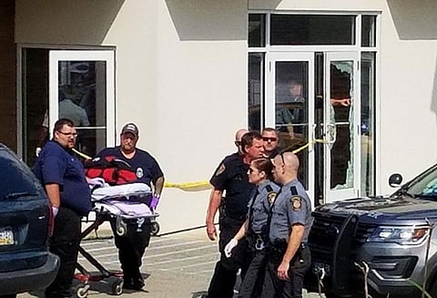 அமெரிக்காவில் கோர்ட்டு வளாகத்தில் துப்பாக்கிச்சூடு; 4 பேர் படுகாயம்