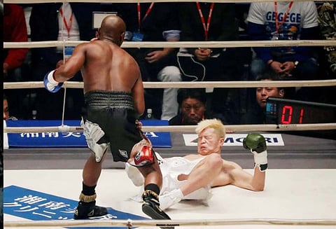 புத்தாண்டு போட்டி: 2 நிமிடங்களில் ரூ.63 கோடி வென்ற ஓய்வு பெற்ற குத்துச்சண்டை வீரர்