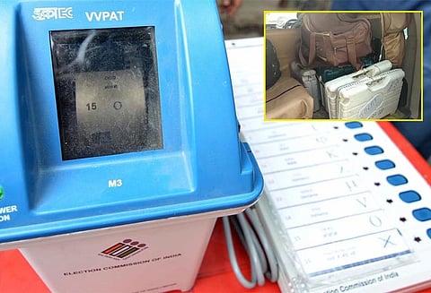ஓட்டலுக்கு கொண்டு செல்லப்பட்ட ஓட்டுப்பதிவு எந்திரங்கள் - எதிர்க்கட்சிகள் ஆர்ப்பாட்டம்; தேர்தல் அதிகாரிக்கு நோட்டீஸ்