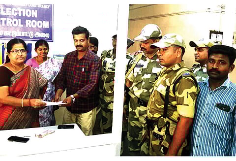 கரூர் நாடாளுமன்ற தொகுதி அ.ம.மு.க. வேட்பாளரிடம் ரூ.2 லட்சம் பறிமுதல் தேர்தல் பறக்கும் படையினர் நடவடிக்கை