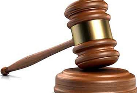 100 நாள் வேலை அடையாள அட்டைகளை வழங்கக்கோரி கிராம மக்கள் சாலை மறியல் 50 பேர் மீது வழக்கு