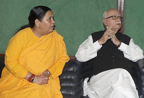 பாபர் மசூதி இடிப்பு வழக்கு : எல்.கே.அத்வானி, உமாபாரதி கோர்ட்டில் ஆஜர் ஆவதில் இருந்து விலக்கு