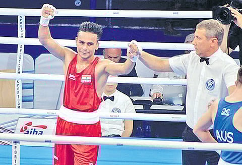 உலக குத்துச்சண்டை போட்டி: இந்திய வீரர்கள் அமித், கவுரவ் கால்இறுதிக்கு தகுதி