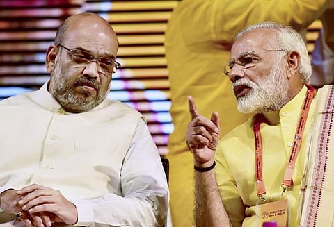 குடும்ப அரசியலை நியாயப்படுத்துவதா? ராகுல் காந்தி மீது அமித் ஷா பாய்ச்சல்