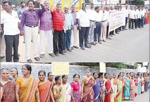 ஊதிய மாற்றத்தை உடனடியாக அமல்படுத்தக்கோரி மனித சங்கிலி பி.எஸ்.என்.எல். ஊழியர்கள் நடத்தினர்