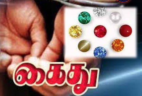 ரூ.2 லட்சம் நவரத்தின கற்களுடன் மாயமான ஆட்டோ டிரைவர் கைது