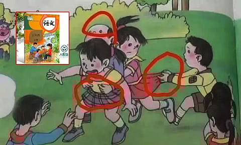 சீனா: பள்ளி பாட புத்தகத்தில் ஆபாச படங்கள்; விசாரணைக்கு உத்தரவு