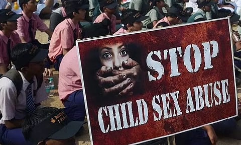 கோர்ட்டு விசாரணைக்கு சென்ற பாலியல் வன்கொடுமைக்கு உள்ளான சிறுமி கால்வாயில் பிணமாக மீட்பு