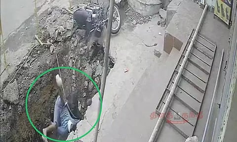 மழைநீர் வடிகால்வாய் பணிக்கு வீட்டு வாசலில் தோண்டப்பட்ட பள்ளத்தில் விழுந்த கம்ப்யூட்டர் என்ஜினீயர்...!