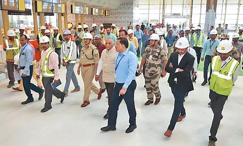 சென்னை விமான நிலைய புதிய முனையம் அடுத்த மாதம் திறப்பு; பணிகளை மத்திய மந்திரி வி.கே.சிங் ஆய்வு