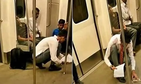 டெல்லி மெட்ரோ ரெயிலில் தரையில் கொட்டிய உணவு... துடைத்து சுத்தம் செய்த மாணவனுக்கு குவியும் பாராட்டுக்கள்