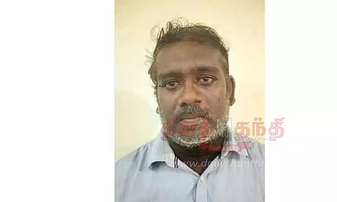 சப்-இன்ஸ்பெக்டருக்கு மிரட்டல் விடுத்தவர் கைது