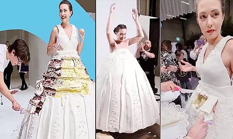 கேக்கை ஆடையாக அணிந்து சாதனை