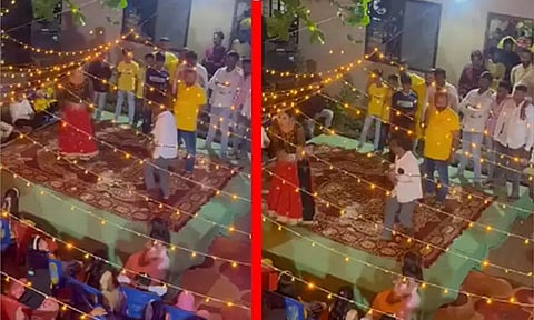 நடனம் ஆடிய பெண் மீது பணமழை; காங்கிரஸ் தொண்டர் மன்னிப்பு கேட்க பா.ஜ.க. வலியுறுத்தல்