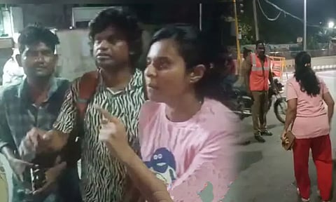 குடிச்சுட்டு வண்டி ஓட்டுனா தான் பைன்,தள்ளிட்டு வந்தா பைன் போடக்கூடாது - போலீசாரிடம் இளம்பெண் வாக்குவாதம்