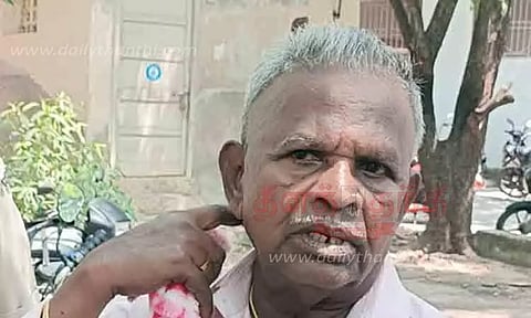 தீக்குளிக்க முயன்ற ஓய்வுபெற்ற கல்வித்துறை அதிகாரி