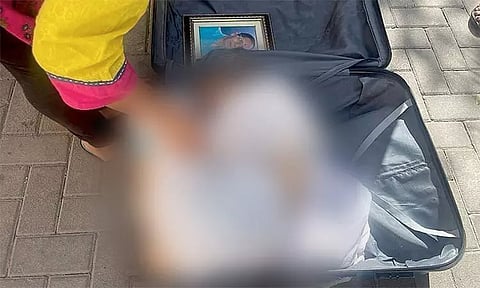 தொடர் சண்டை: சூட்கேசில் தாயின் சடலுத்துடன் காவல் நிலையத்திற்கு சென்ற பெண்;அதிர்ச்சி அடைந்த போலீசார்