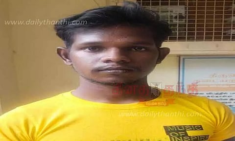 தொழிலாளி கொலை - வாலிபர் கைது