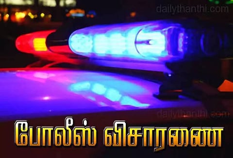 போலீஸ் நிலையம் முன்பு விவசாயி தீக்குளிக்க முயற்சி