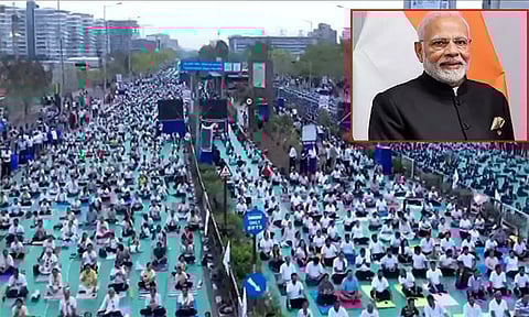 குஜராத்: 1 லட்சம் பேர் யோகா செய்து கின்னஸ் உலக சாதனை; பிரதமர் மோடி வாழ்த்து