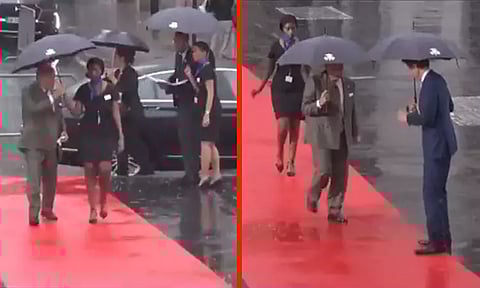 பிரான்ஸ்: குடையுடன் வந்த பெண் அதிகாரியை மழையில் நனைய விட்ட பாகிஸ்தான் பிரதமர்; நெட்டிசன்கள் விமர்சனம்