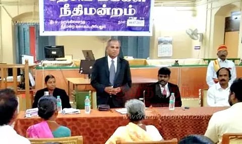 சிறப்பு மக்கள் நீதிமன்றத்தில் 512 வழக்குகளுக்கு தீர்வு